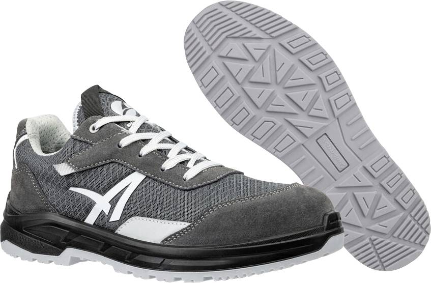 Grau-schwarzer Sportarbeiterschuh in Seitenansicht mit der Sohle oben dargestellt, wobei das Profil- und Lochstickenmuster hervorgehoben wird.