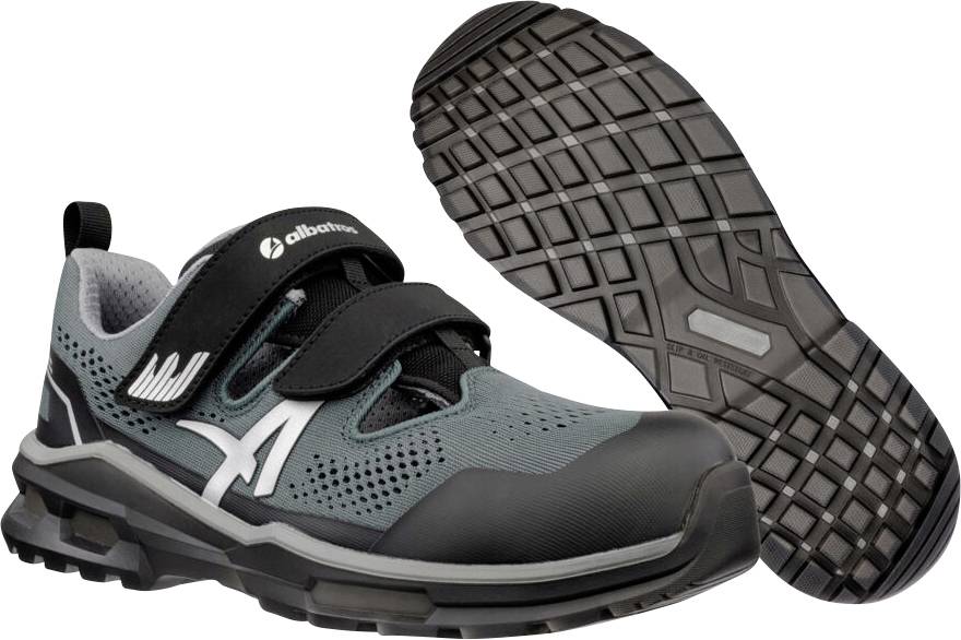 Paar graue und schwarze Arbeitsschuhe mit athletischem Design, von der Seite und Sohle gezeigt, mit robustem rutschfestem Profil.
