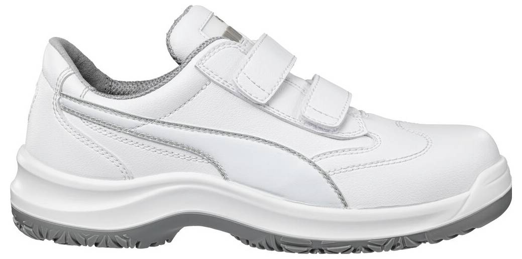 Weißer Sportschuh mit zwei Klettverschlüssen und grauer Sohle, in Seitenansicht auf neutralem Hintergrund dargestellt.