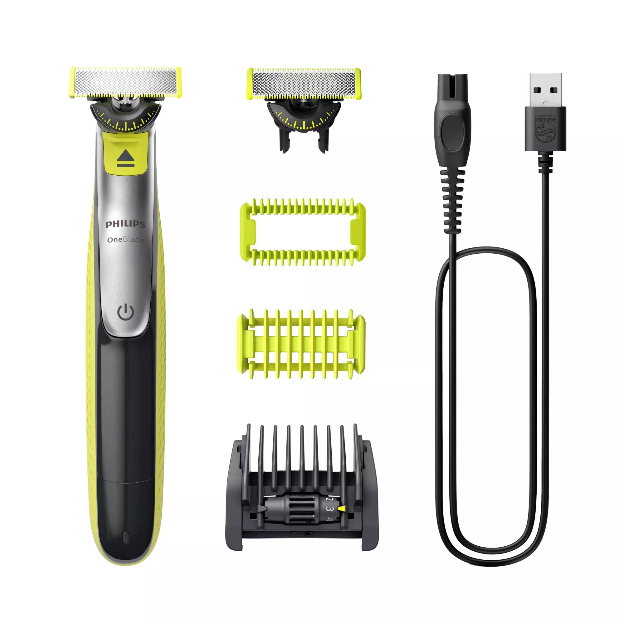 Philips OneBlade Trimmer mit zwei Klingen, zwei Kammaufsätzen, Ladestation und USB-Ladekabel auf weißem Hintergrund.