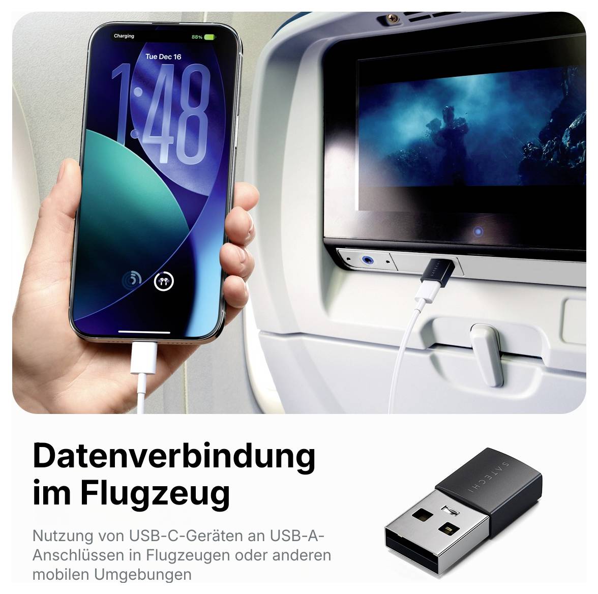 # Deutsche Übersetzung:Hand hält iPhone, das sich über Kabel auf Flugzeugsitz auflädt; Bildschirm an Sitzlehne und deutscher Text „Datenverbindung im Flugzeug