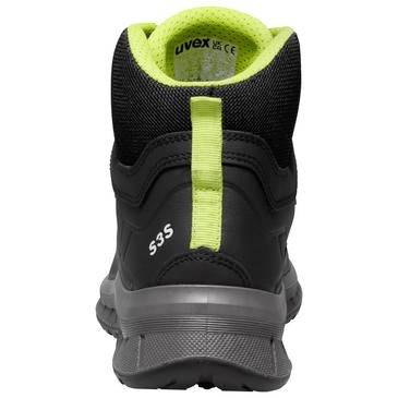 Rückansicht eines schwarzen und neongrünen Uvex-Sicherheitsstiefels mit dicker grauer Sohle und Zuglasche.