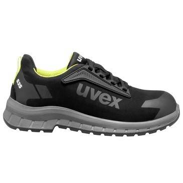Schwarzer uvex Sicherheitsschuh mit niedrigem Schaft, grauer Sohle und neongelber Fütterung, in Seitenansicht auf weißem Hintergrund dargestellt.