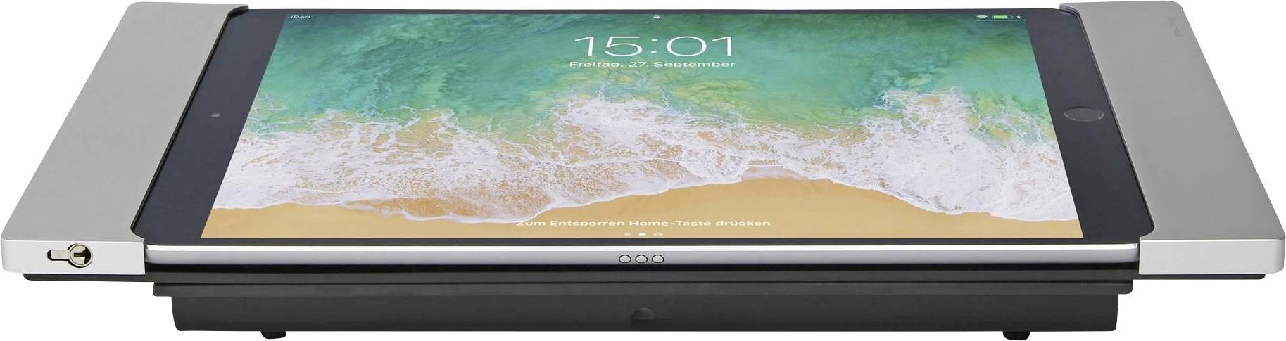 Tablet in einem silbernen Docking-Tastaturen-Gehäuse, dargestellt geschlossen mit dem Bildschirm, auf dem ein Strand-Hintergrundbild und die Uhrzeit 15:01 angezeigt werden.