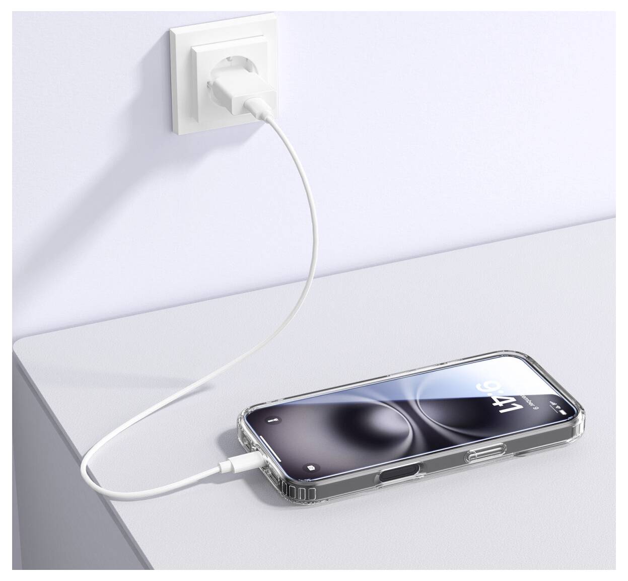 Ein Smartphone lädt auf einem weißen Schreibtisch mit einem Kabel, das in eine Wandsteckdose gesteckt ist.