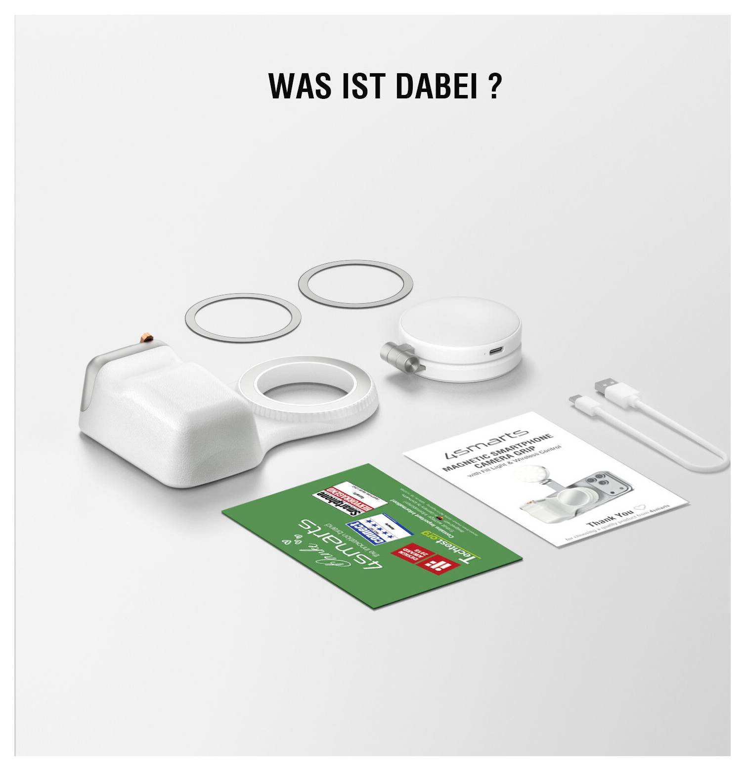 Produktinhalte auf weißem Hintergrund unter „WAS IST DABEI?": weißes Sensorgerät, Ringe, rundes Gerät, Kabel und zwei Anleitungs-/Informationskarten.