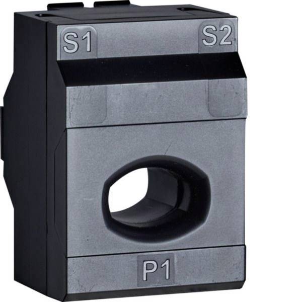 Kompakter Stromstärkesensor-Block mit Beschriftung S1, S2 und P1 mit einer kreisförmigen Öffnung in der Mitte.