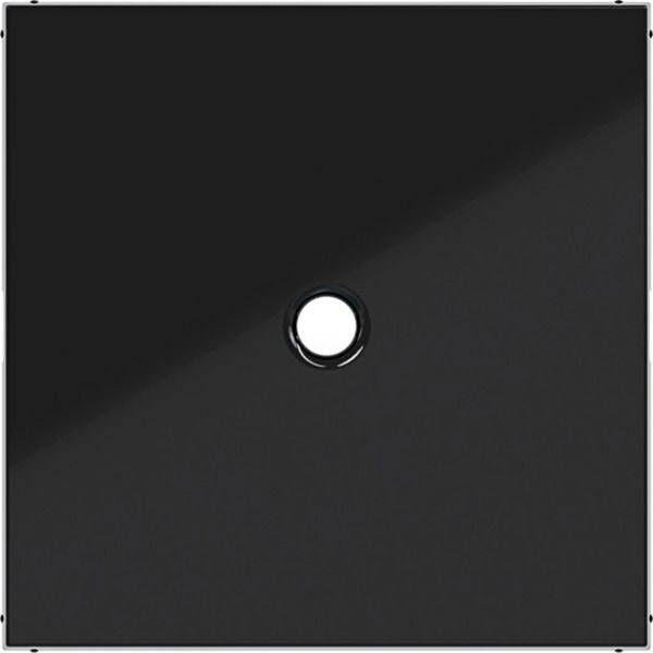 Schwarzes quadratisches Paneel mit einem kleinen zentrierten kreisförmigen Loch auf einfachem Hintergrund.