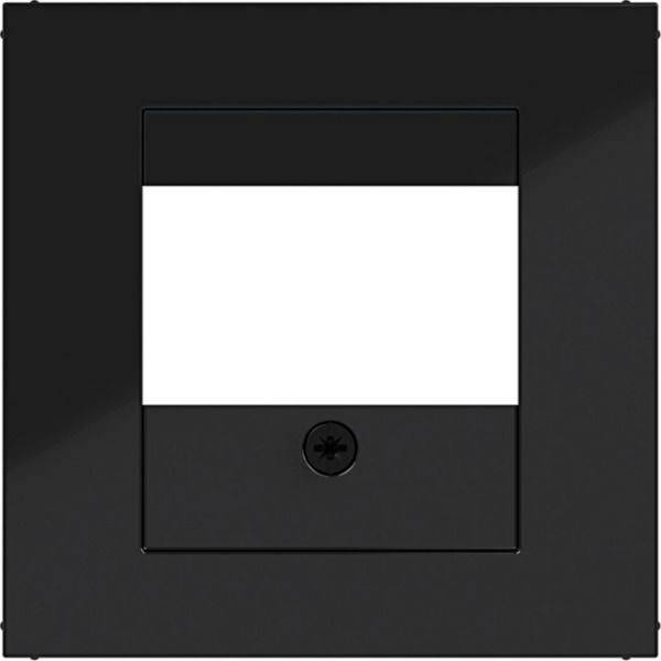 Schwarze Wandplatte mit einem zentrierten rechteckigen weißen Lichtpaneel und kleinem kreisförmigem Schalter darunter.