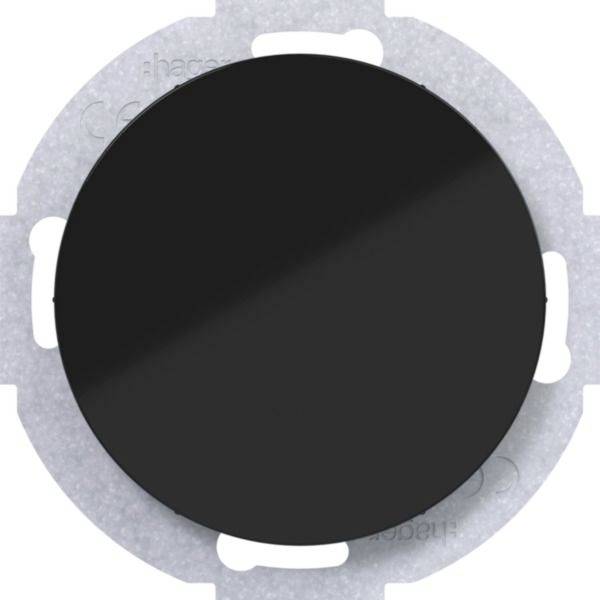 Schwarze kreisförmige Abdeckung oder Taste, zentriert auf einem hellgrauen runden Ring mit vier weißen Laschen, ähnlich wie eine elektrische oder Gerätekomponente.