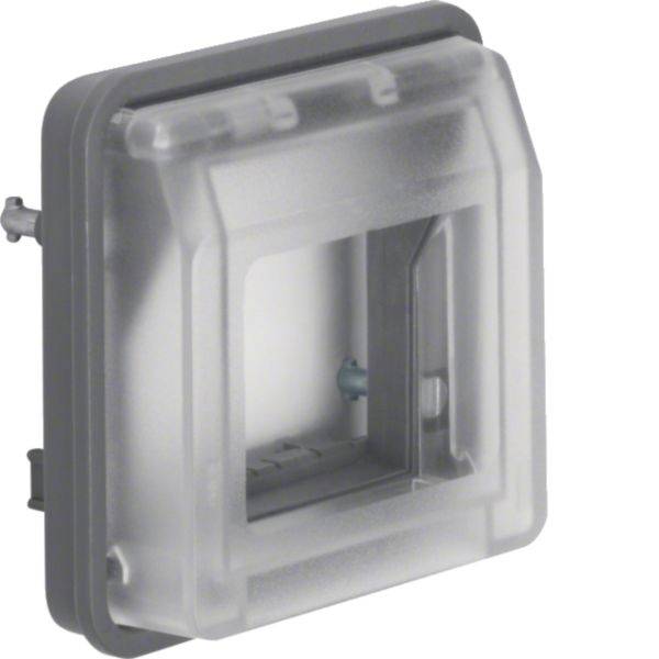 Transparente Kunststoff-Elektroverteilerdose mit quadratischer vertiefter Öffnung und seitlichen Befestigungslaschen, dargestellt auf weißem Hintergrund.