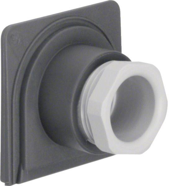 Nahaufnahme eines schwarzen wandmontierten Elektroinstallationskanals-Verbinders mit einer weißen Gewindekappel/einem weißen Gewindead adapter auf einer quadratischen Grundplatte.