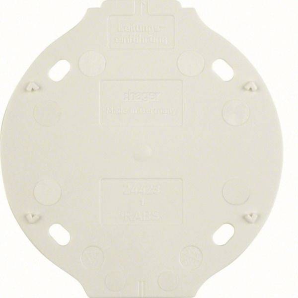 Rundes weißes Kunststoffdeckel für Batteriefach mit Befestigungsnuten und geprägten Beschriftungen, dargestellt vor neutralem Hintergrund.
