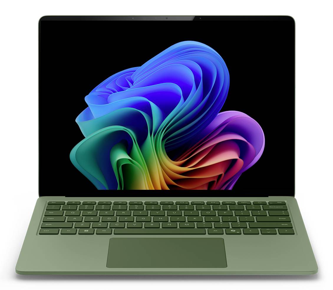 Grüner Laptop mit schwarzem Bildschirm, auf dem ein farbenfrohe abstrakte blumenähnliche Wirbel-Hintergrundbild angezeigt wird.