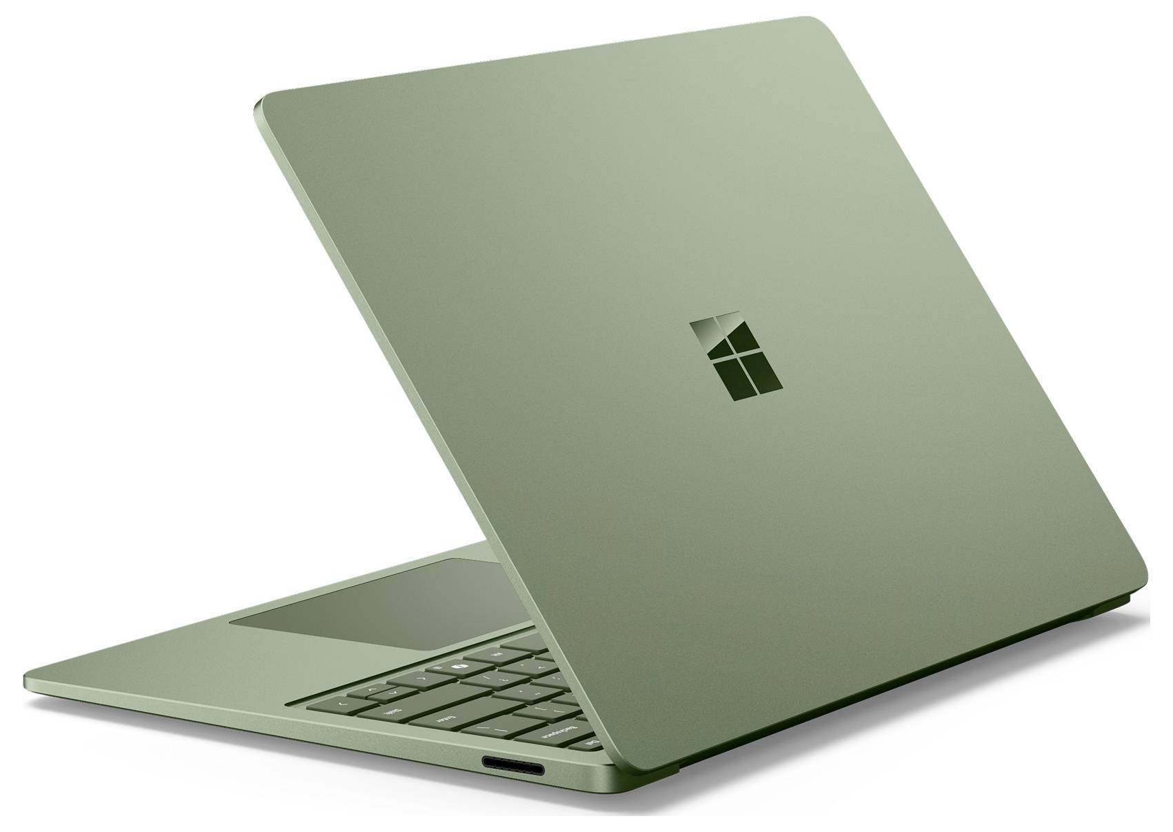 Grüner Microsoft Surface-Laptop, teilweise geöffnet auf weißem Hintergrund, zeigt die Tastatur und das zentrierte Windows-Logo auf dem Deckel.
