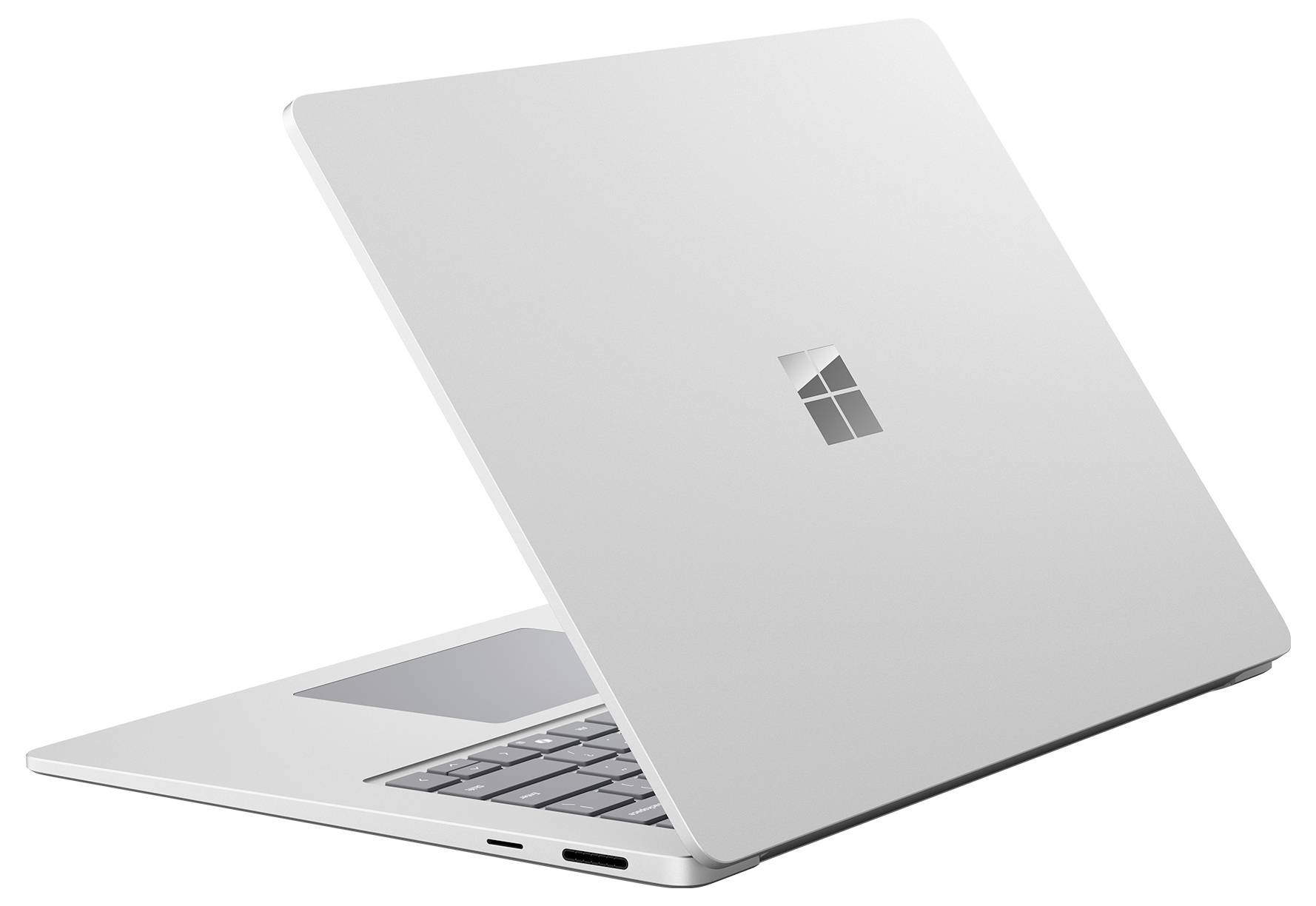 Silberner Laptop, teilweise geöffnet mit nach oben geneigtem Deckel, auf der Rückseite des Covers das Windows-Logo angezeigt.