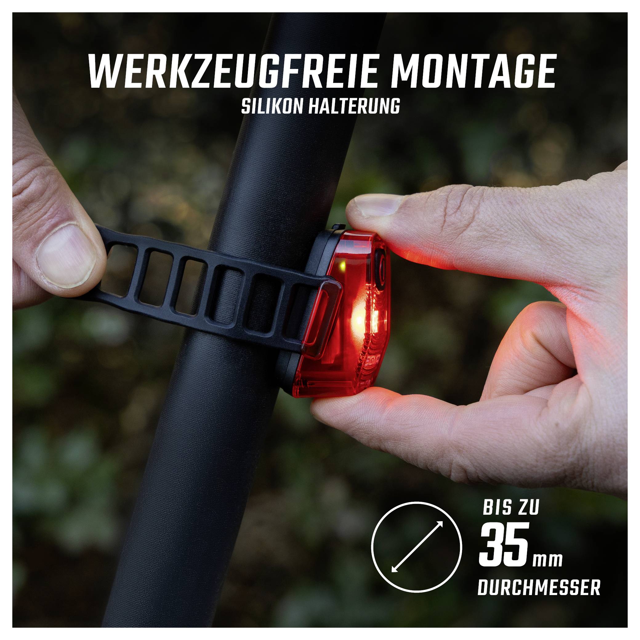 Hände befestigen ein rotes Fahrradlicht werkzeugfrei mit Silikonhalterung am Rahmen; geeignet bis 35 mm Durchmesser.