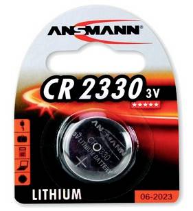 Verpackung einer Ansmann CR 2330 3V Lithium-Knopfzelle in Blisterverpackung, mit der Aufschrift 