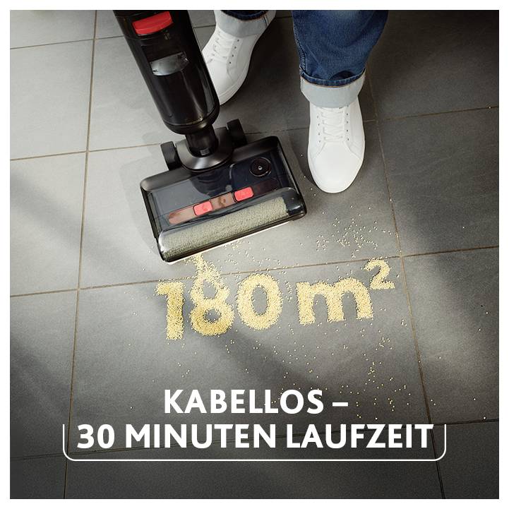 Kabelloser Staubsauger auf Fliesen saugt verschüttetes Material; Text nennt '180 m²' und '30 Minuten Laufzeit'.