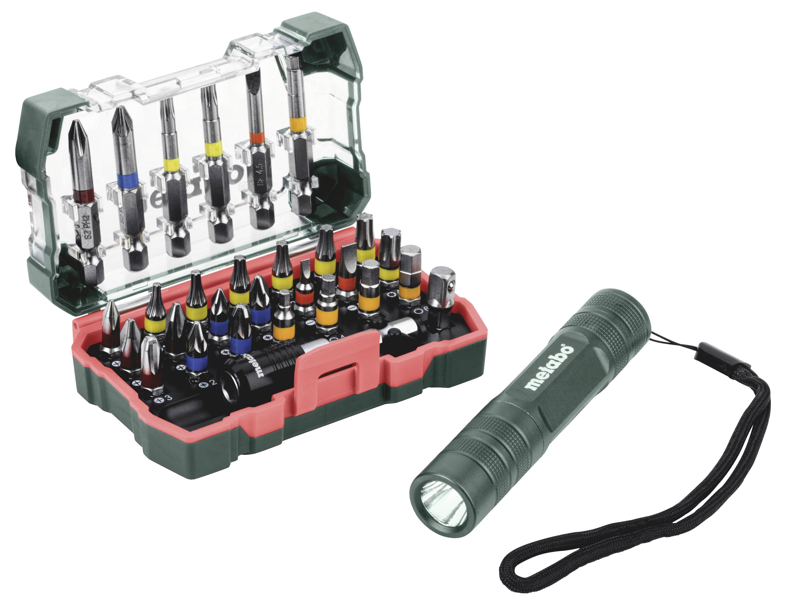 Ein Schraubendreher-Bitset in einem grün-roten Koffer mit vielen Bits, die in Reihen angeordnet sind, plus einer passenden grünen Taschenlampe daneben.