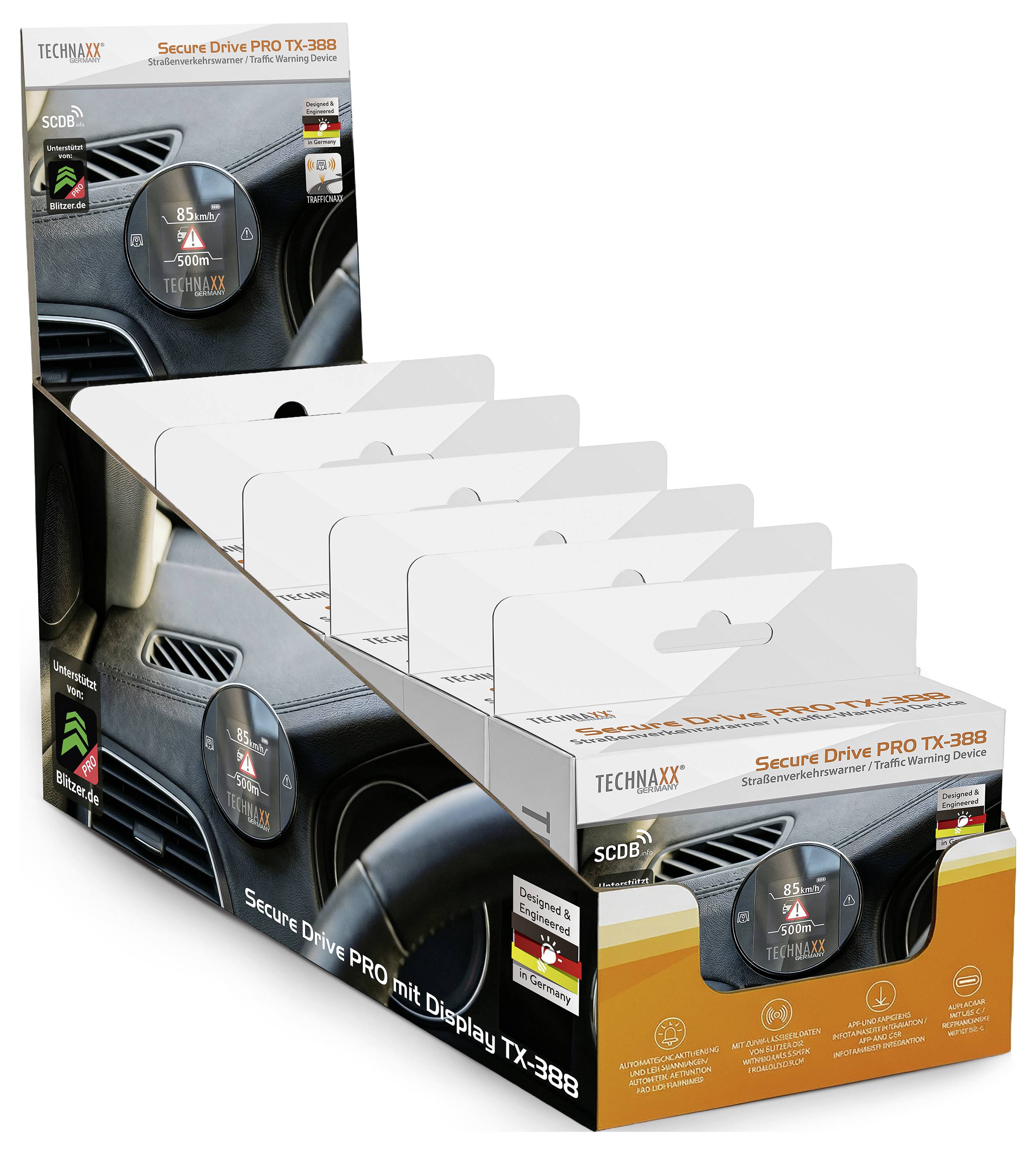 Stapel von Technaxx Secure Drive PRO TX-388 Verkehrswarnsystem-Einzelhandelsboxen, die in einem Ladenständer ausgestellt sind.
