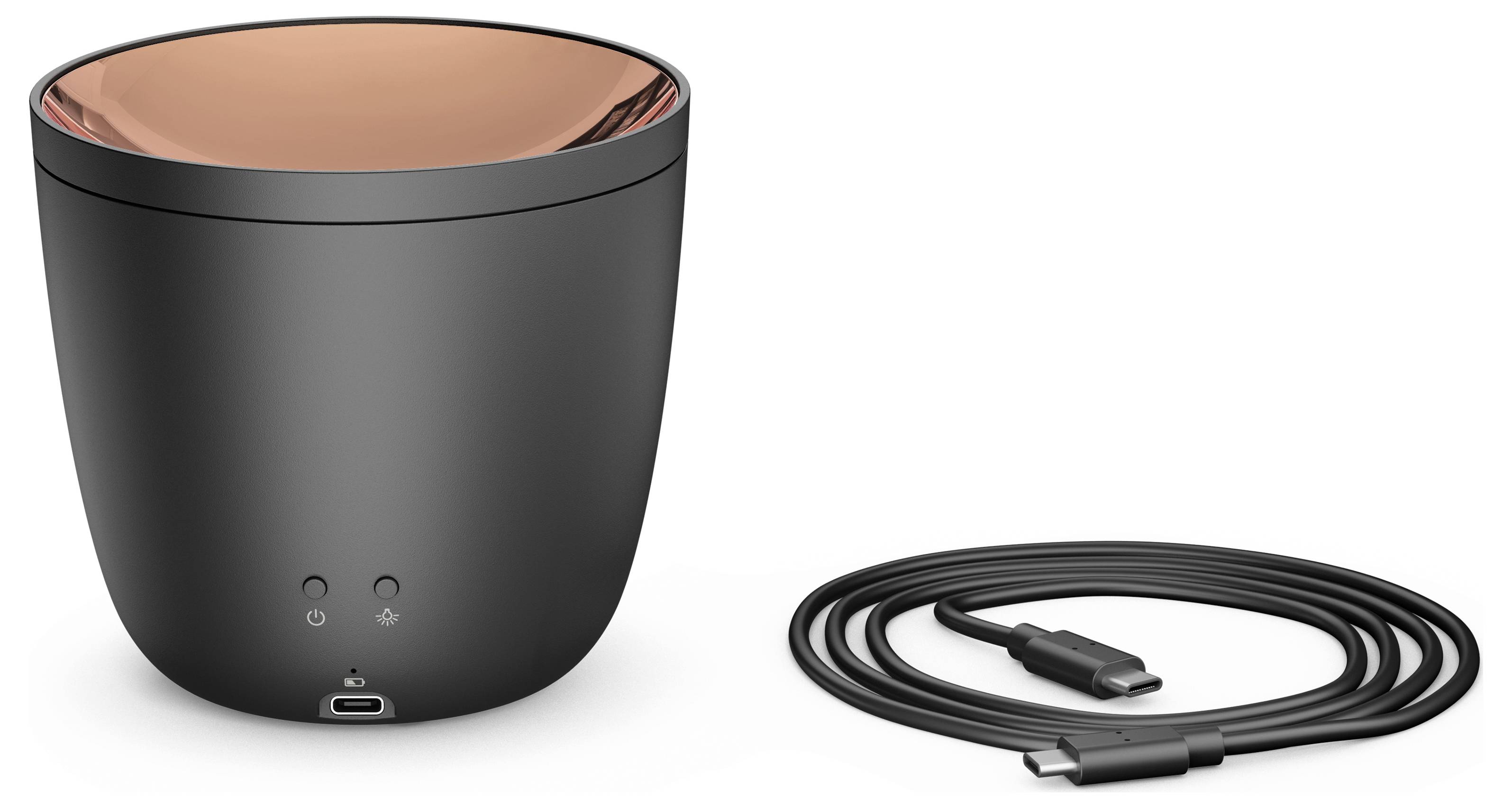 Schwarzes zylindrisches Gerät mit kupferfarbener Oberseite, USB-C-Anschluss und Anzeigelichtern, neben einem USB-Kabel auf weißem Hintergrund.