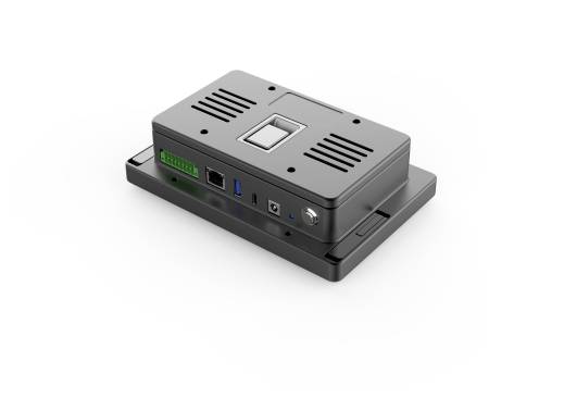 Kompaktes schwarzes elektronisches Steuermodul mit Lüftungsöffnungen, kleinem Anzeigefeld, Anschlussleiste, Anschlüssen und Drehknopf auf einer Grundplatte.