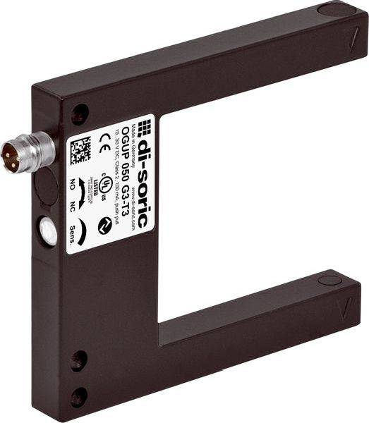 Foto eines braunen U-förmigen Di-soric Opticsensors mit einem Metallstecker und Etikett, isoliert auf weißem Hintergrund gezeigt.