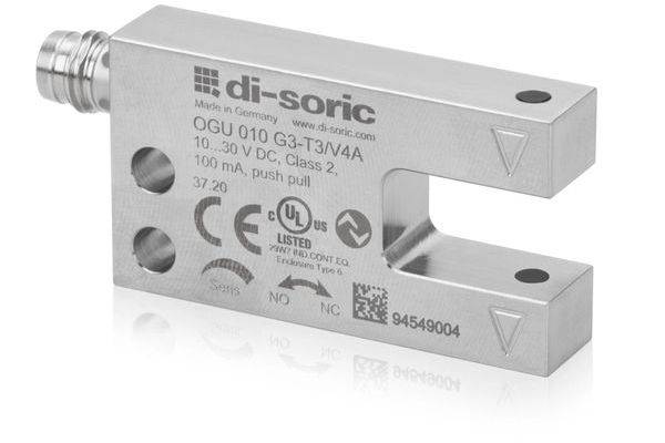 Ein silberner di-sorischer Industrie-Sensor mit U-förmigem Schlitz, gekennzeichnet mit „OGU 010 G3-T3/V4A
