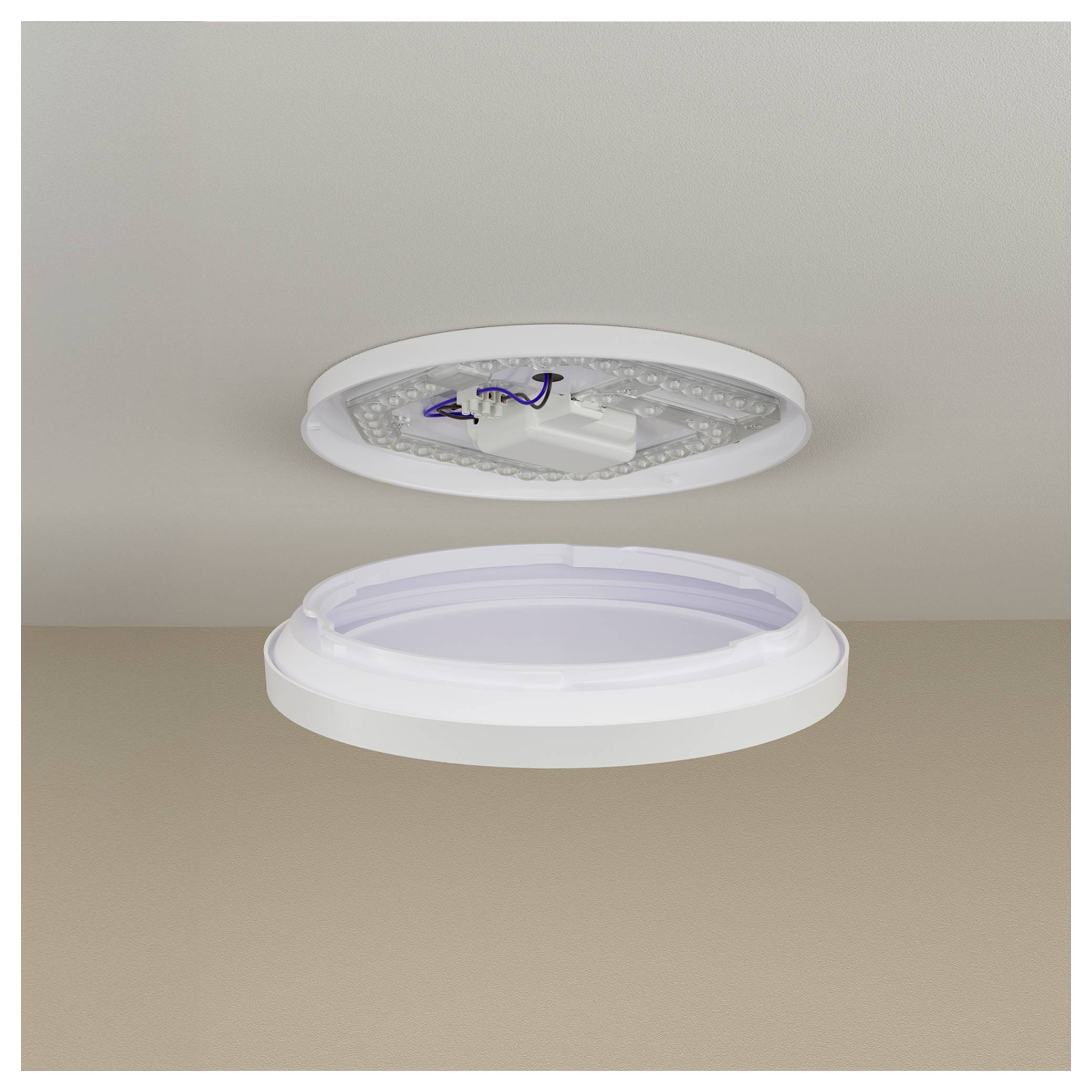 Explosionszeichnung einer runden Deckenleuchte, die die Basis mit der Verkabelung oben und dem Diffusordiffusor unten zeigt.