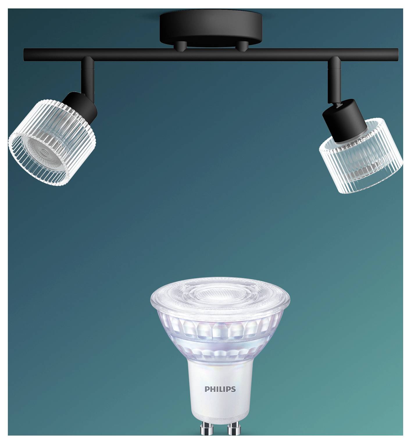Philips LED-Spotleuchten-Glühbirne, unten zwei deckenmontierten Spotleuchten auf tealbauem Hintergrund dargestellt.