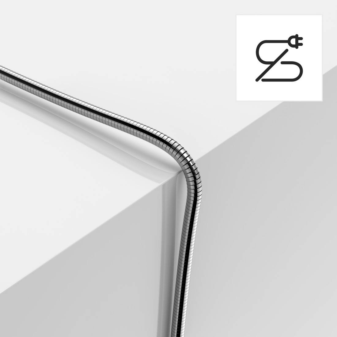 Flexibles Metallladekabel, das um eine Ecke gebogen ist, mit einem kleinen Stecker-Symbol oben rechts.