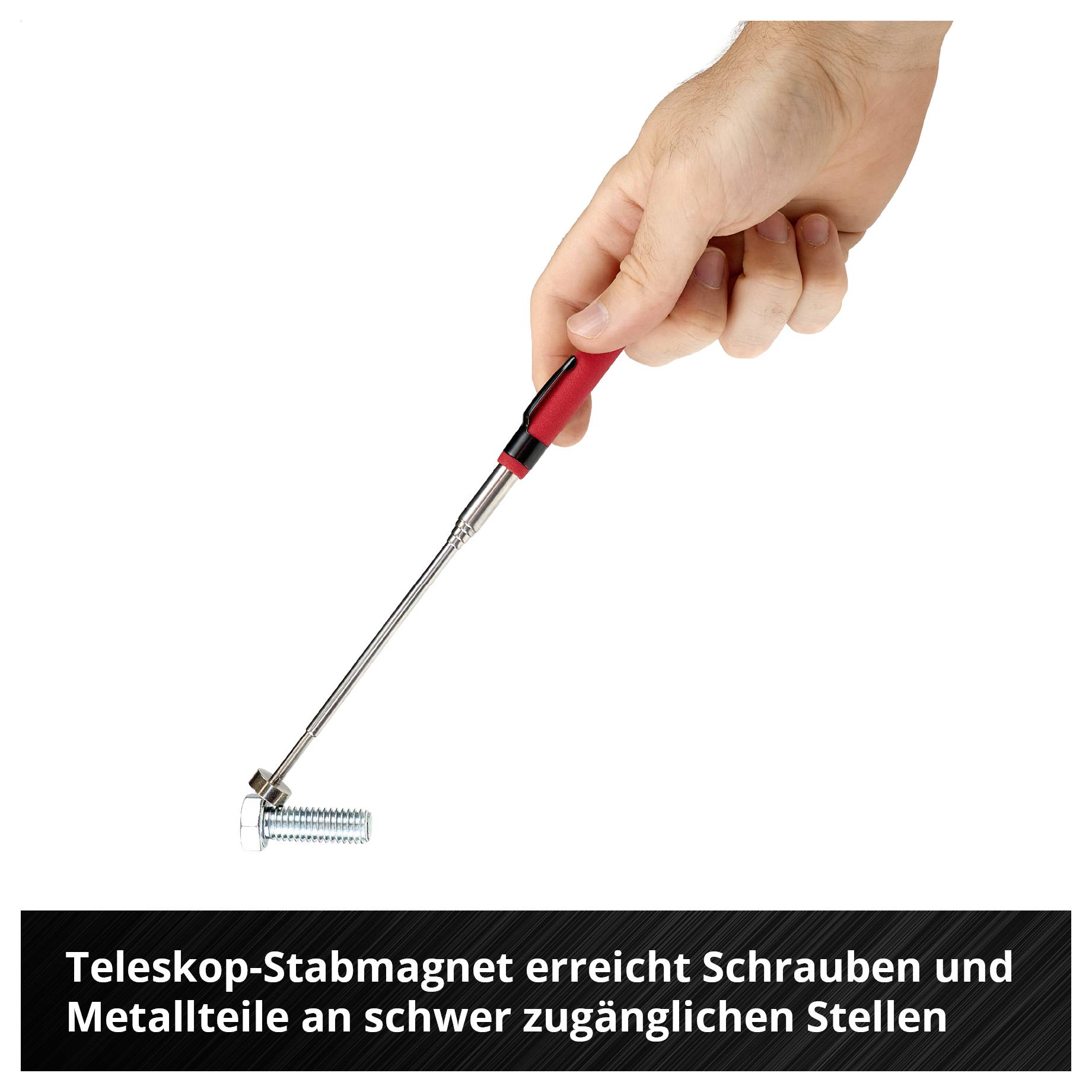 Hand bedient einen Teleskop-Stabmagneten, der eine Schraube an schwer zugänglicher Stelle erreicht.