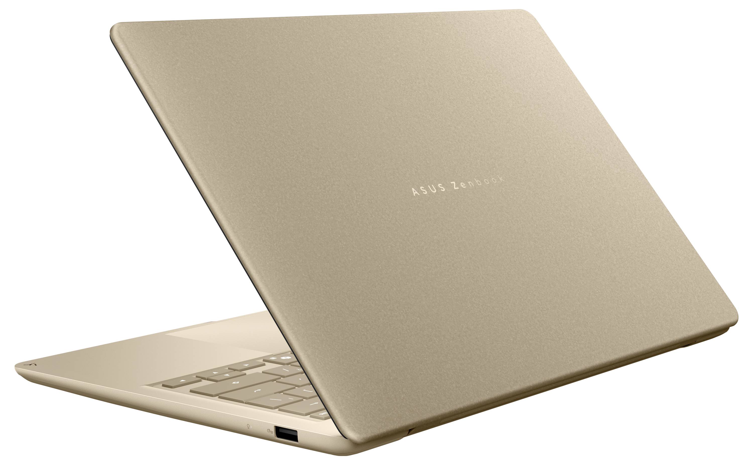 Offenes goldenes Laptop, teilweise geschlossen gezeigt, mit sichtbarer Tastatur und USB-C-Anschluss an der Seite.
