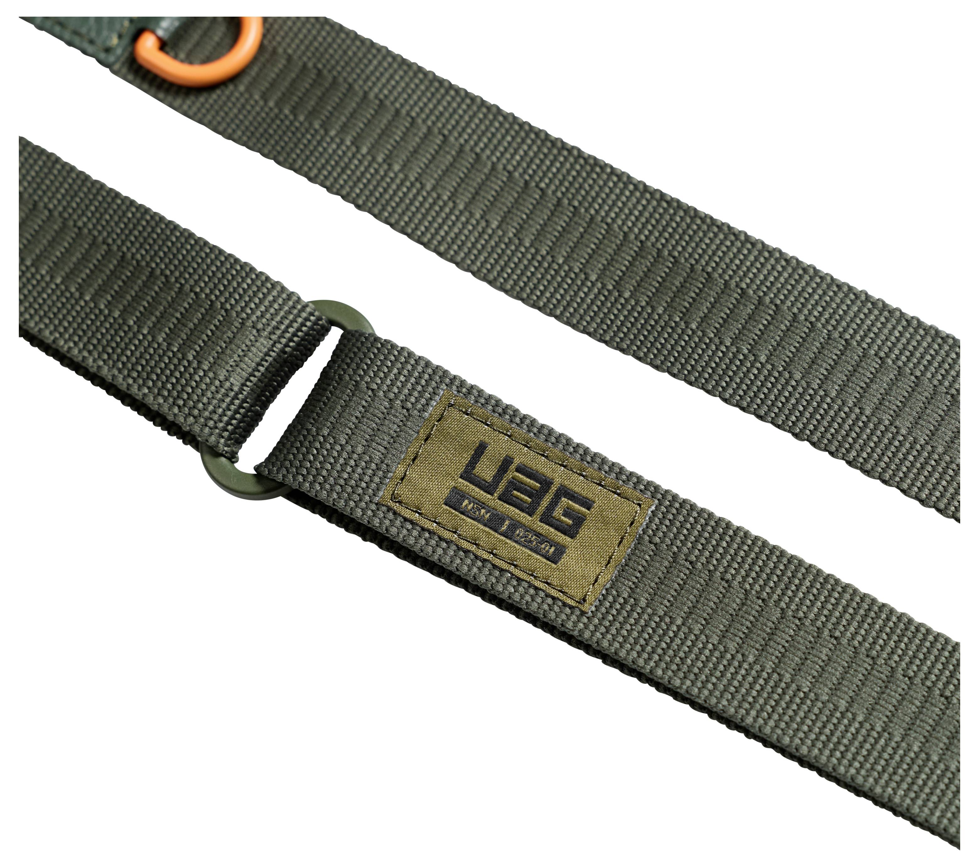 Grüner Nylonriemen mit Schnalle und Metallring, mit einem „UAG"-Etikett-Patch auf weißem Hintergrund.