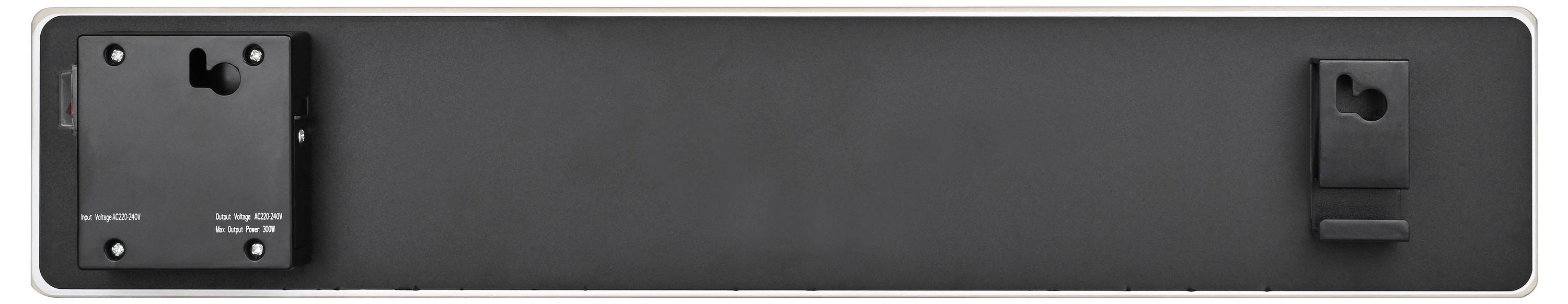 Zwei schwarze wandmontierte Geräte auf einem dunklen Panel: eine größere Steuerkastenschaltung mit einer Beschriftung und eine kleinere Halterung oder ein Sensor auf der rechten Seite.