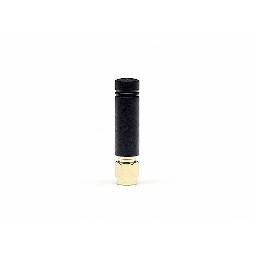 Kleine schwarze zylindrische Antenne mit goldenem Anschluss, isoliert auf weißem Hintergrund.