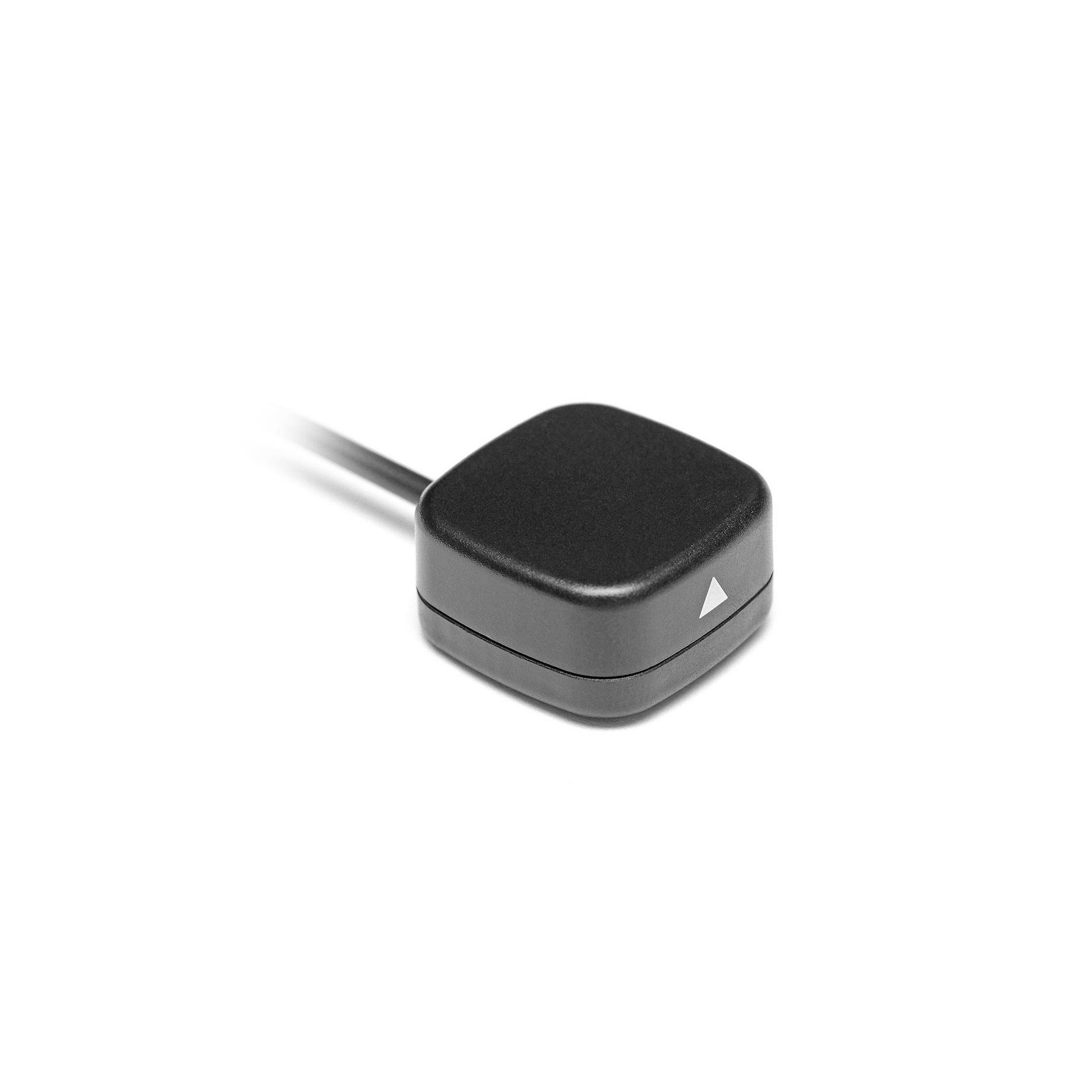 Kleine schwarze Taste oder Sensor mit Draht und weißer dreieckiger Markierung auf einer Seite, gezeigt auf einem einfachen weißen Hintergrund.