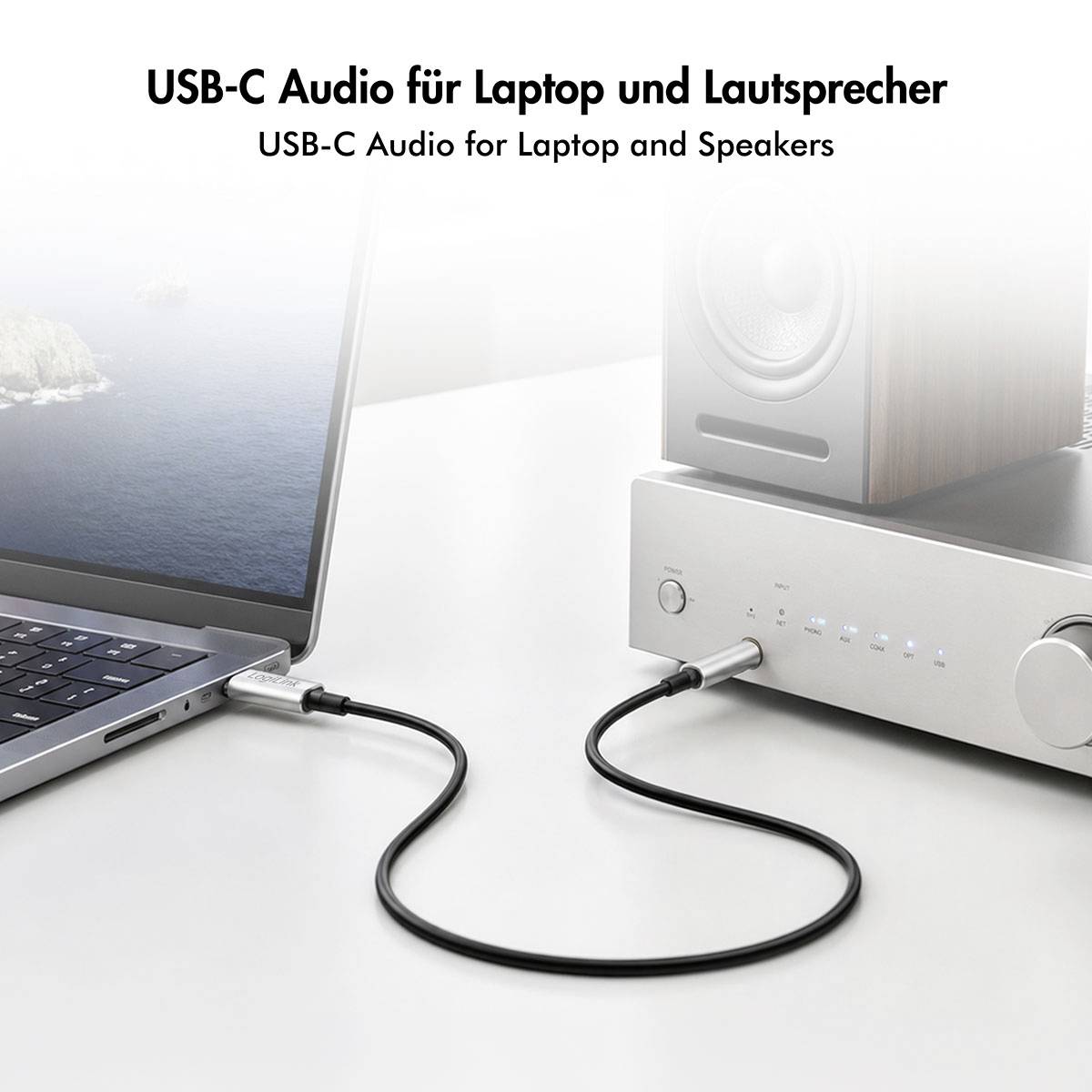 USB-C-Kabel verbindet einen Laptop mit einem Lautsprechersystem und zeigt USB-C-Audio für Laptops und Lautsprecher.