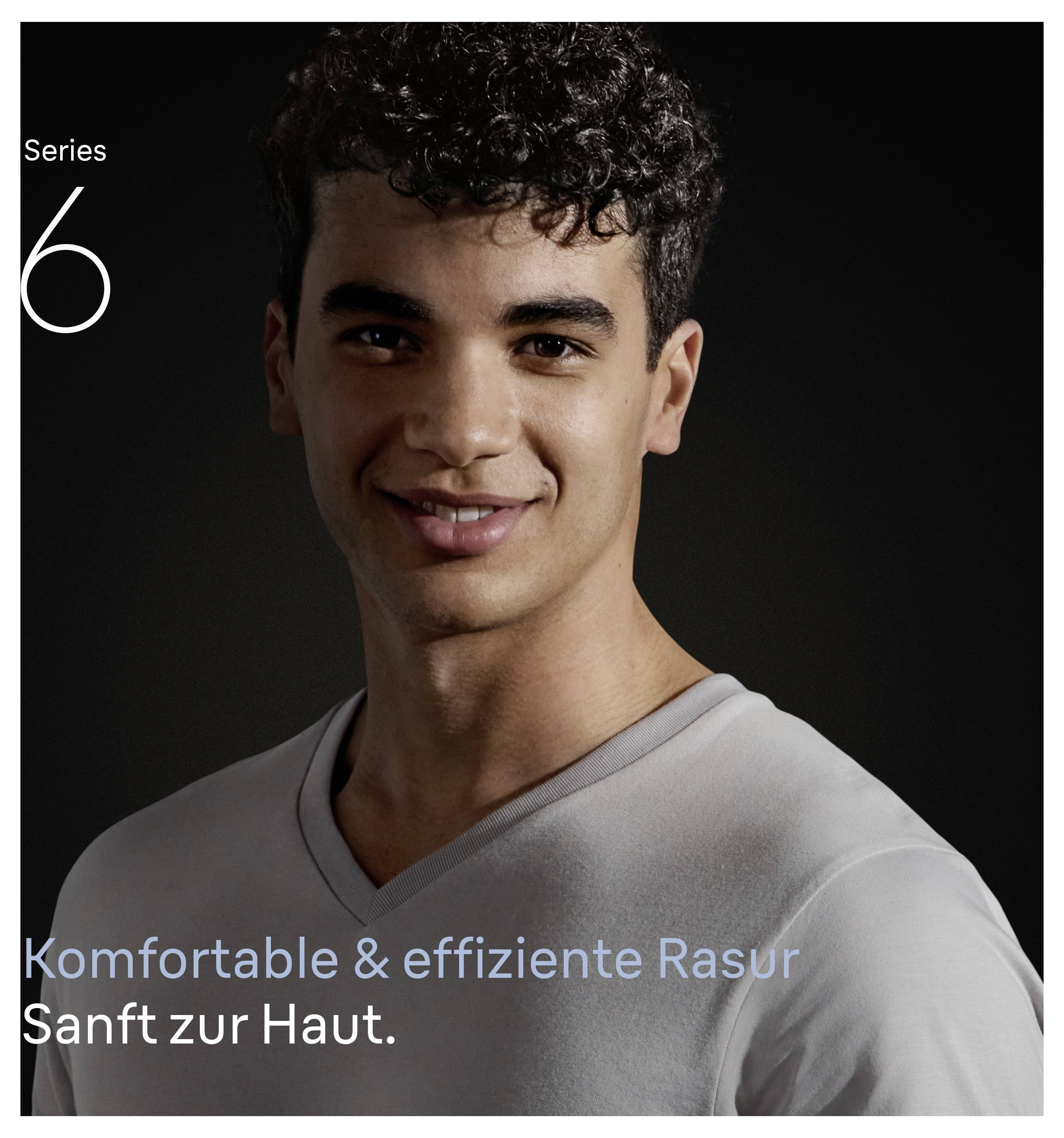Porträt eines lächelnden jungen Mannes in einem grauen V-Ausschnitt-Hemd, mit dem Text „Serie 6" und „Komfortable & effiziente Rasur Sanft zur Haut."
