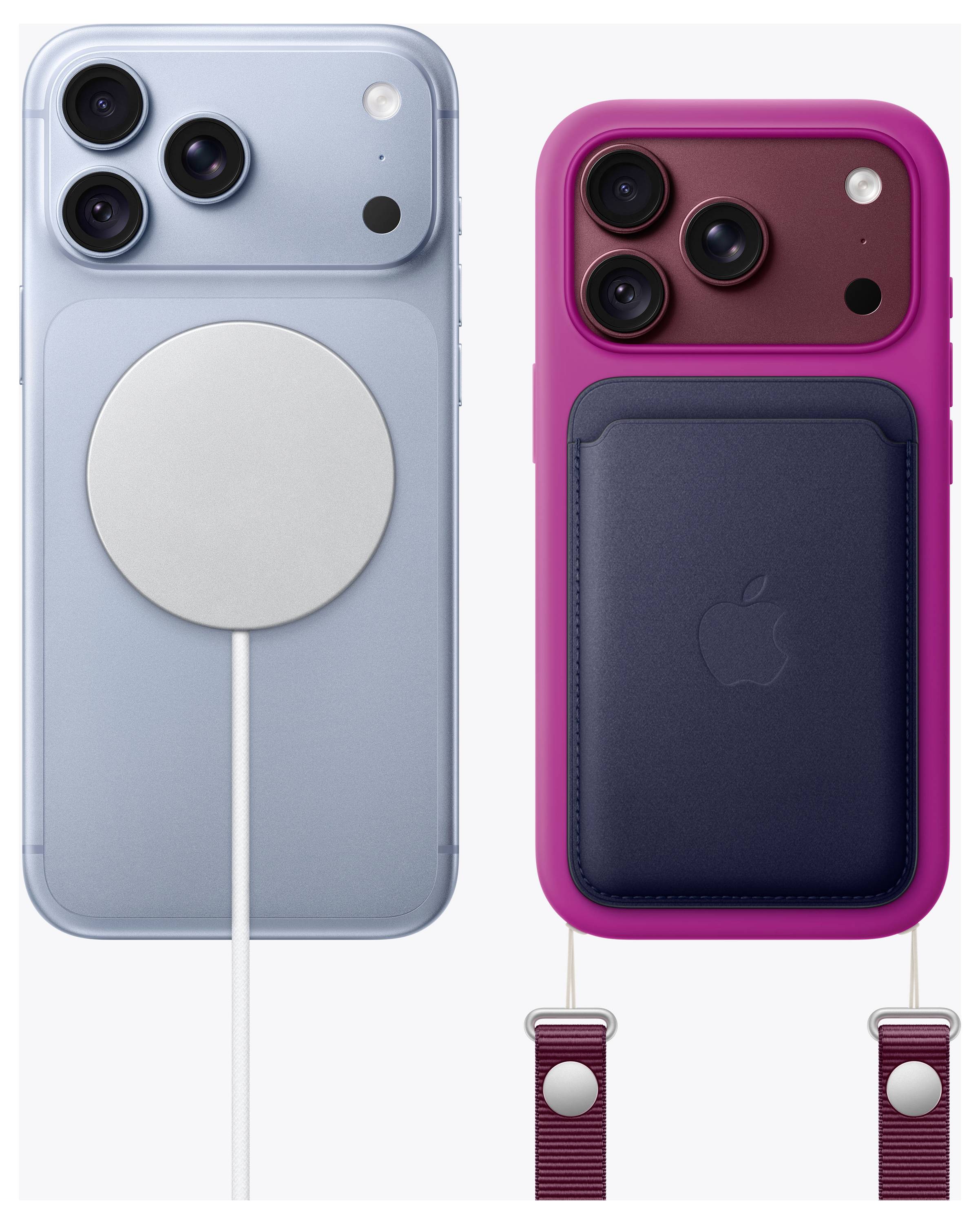 Zwei iPhones mit MagSafe-Zubehör: ein blaues Telefon mit einem angebrachten kreisförmigen kabellosen Ladegerät und ein rosa Telefon mit einer dunklen Kartengeldbörse und einer Schlaufenanbringung.