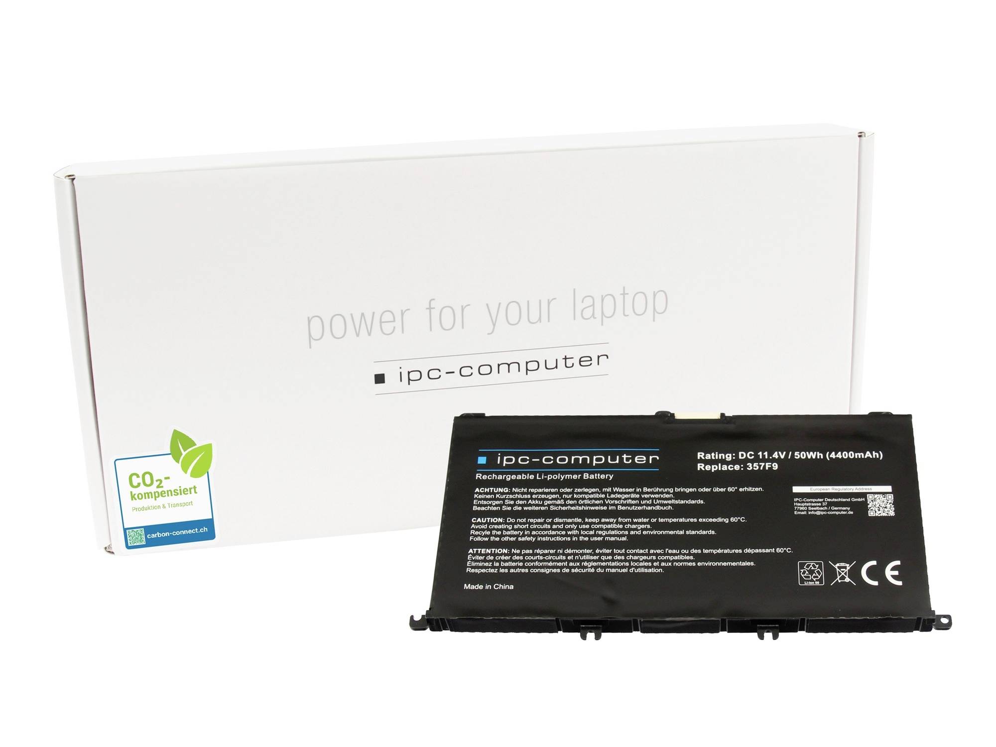 Laptop-Ersatzbatterie vor einer weißen Box mit der Aufschrift 