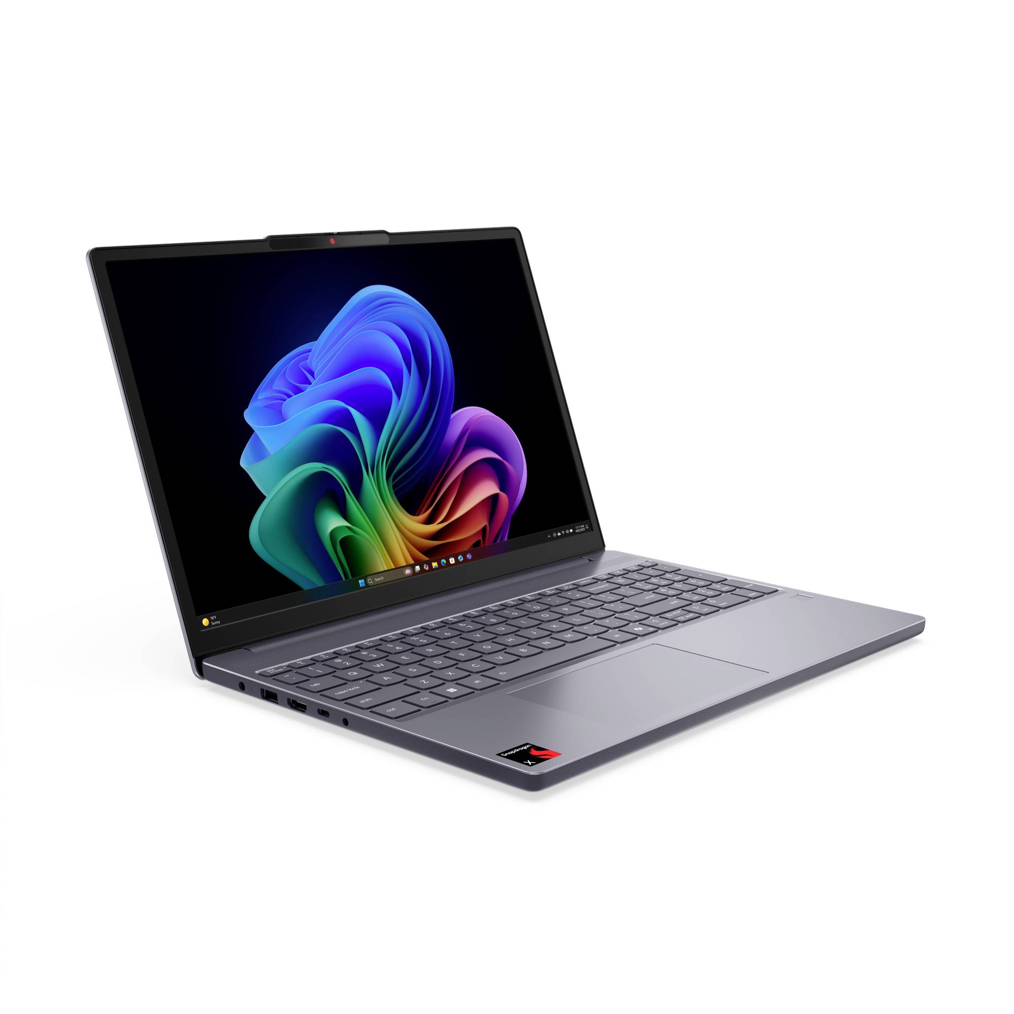 Grauer Laptop, der in einem Winkel geöffnet gezeigt wird, mit einer farbenfrohen abstrakten Blumentapete auf dem Bildschirm.