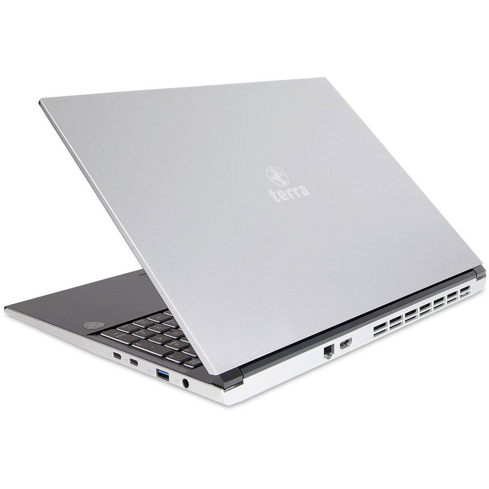 Silver Terra Laptop teilweise geöffnet, zeigt Tastatur und seitliche Anschlüsse auf weißem Hintergrund.