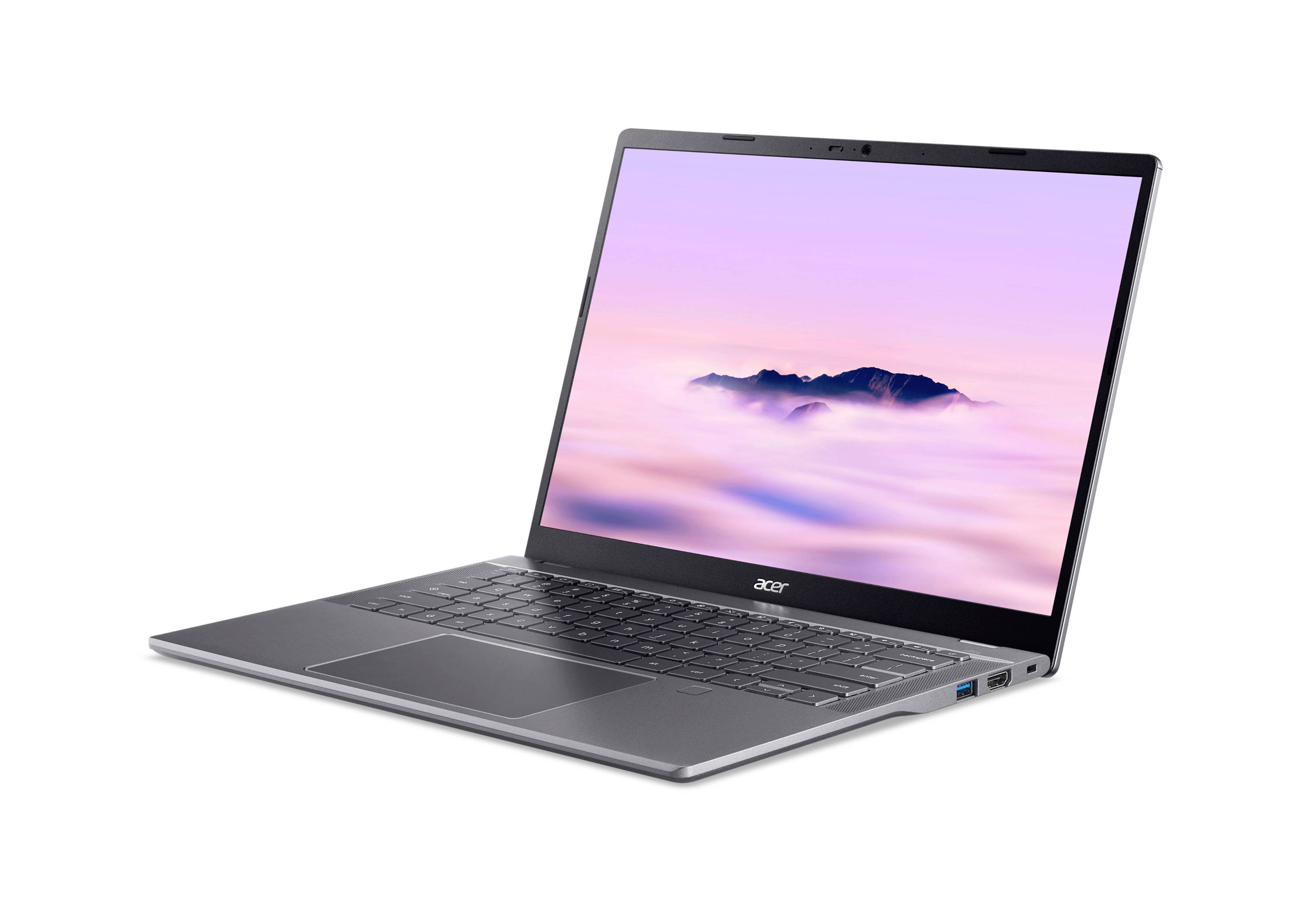 Silberner Acer Laptop in einem Winkel geöffnet, zeigt eine Pastellberglandschaft auf dem Bildschirm.