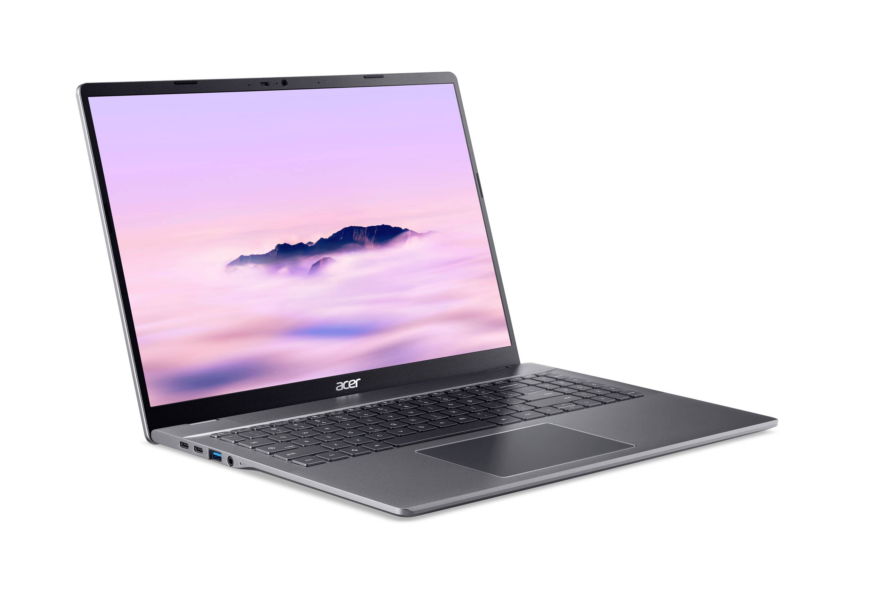 Ein silberner Acer-Laptop, der in einem Winkel geöffnet ist und zeigt einen Berg über rosa Wolken auf dem Bildschirm.