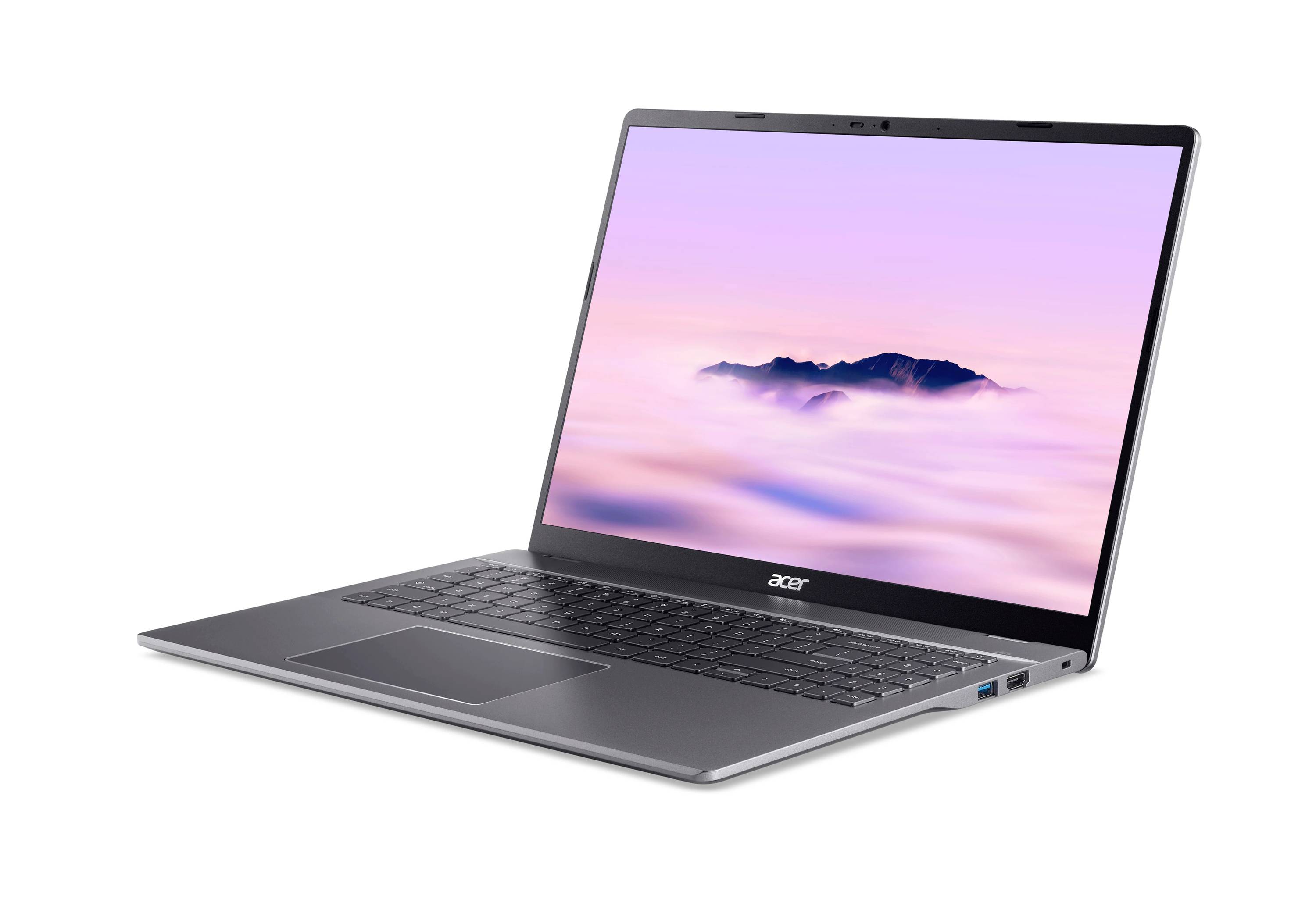 Ein silberner Acer-Laptop ist in einem Winkel geöffnet und zeigt ein rosafarbenes Landschafts-Hintergrundbild auf dem Bildschirm.