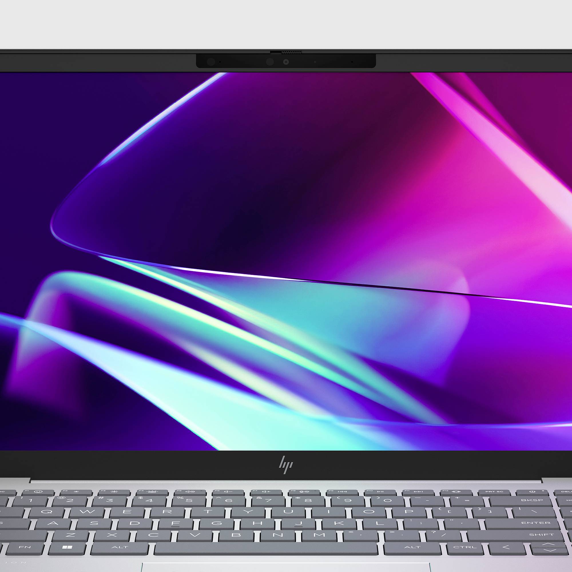 Silber-HP-Laptop mit lebendiger lila und blauer abstrakter Hintergrundbildschirm