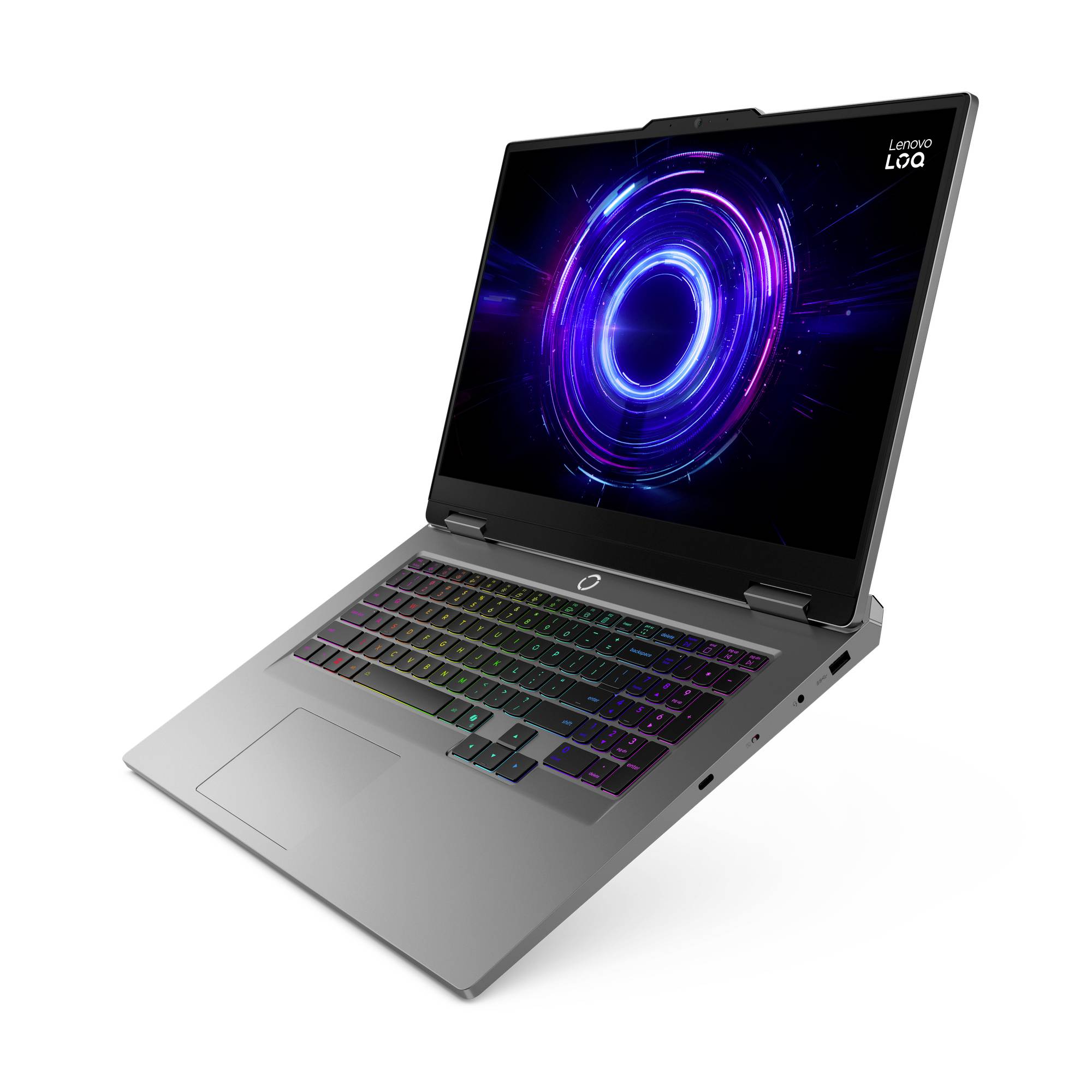 Offener silberner Lenovo LOQ Laptop mit RGB-Tastatur und violarer kreisförmiger Grafik auf dem Bildschirm, in einem Winkel auf weißem Hintergrund dargestellt