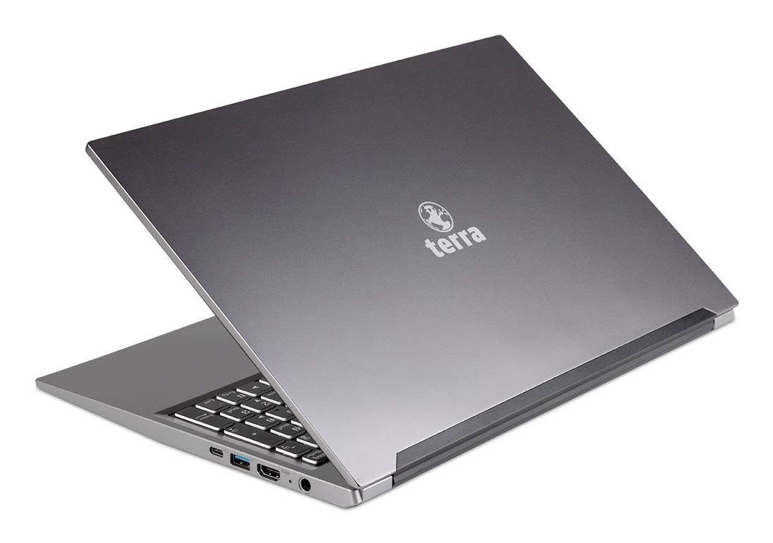 Terra Laptop teilweise geschlossen auf weißem Hintergrund, zeigt die Tastatur und seitliche Anschlüsse.